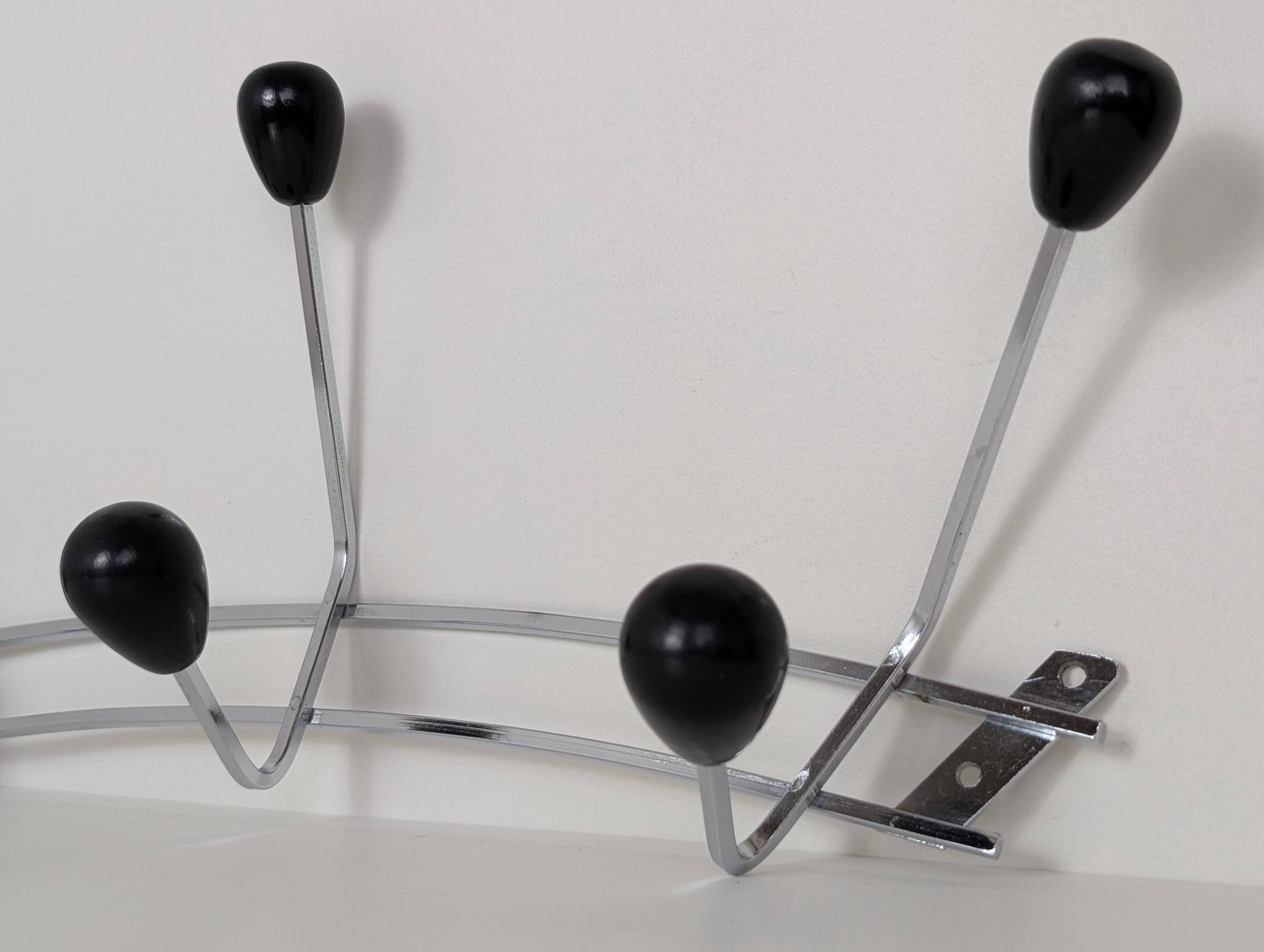 Chrome wall-mounted coat rack