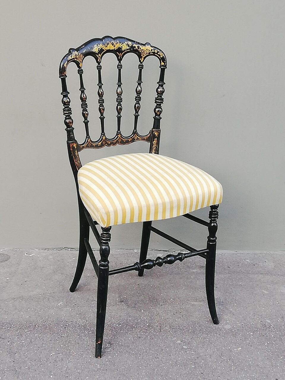 Napoleon III chair late 19th in blackened wood with gilded patterns