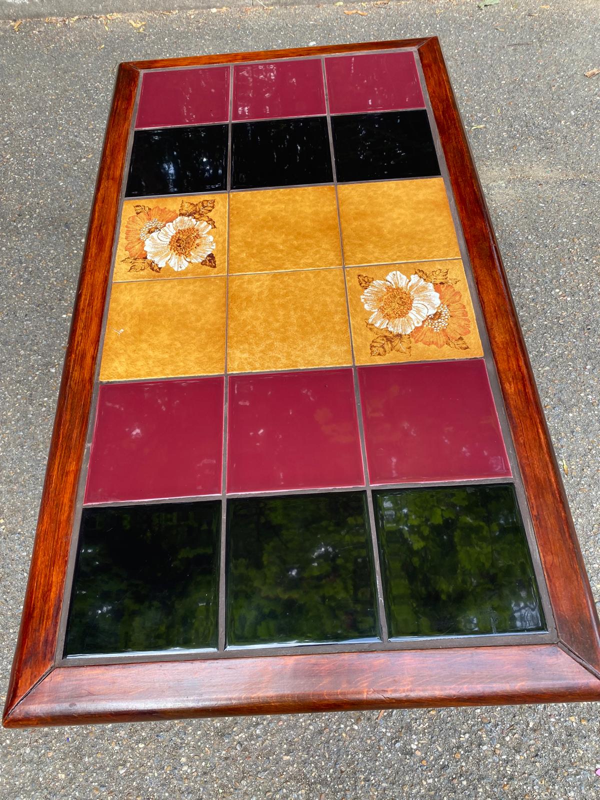 Solid wood and multicoloured ceramic coffee table from the 1970s.