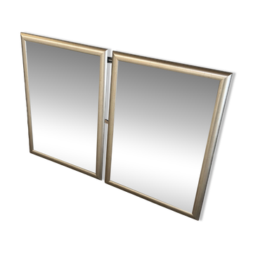 Deux Miroirs biseautés avec encadrement en finition effet or blanc vieilli