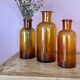 Amber glass vase bottle