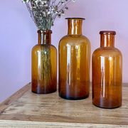 Amber glass vase bottle