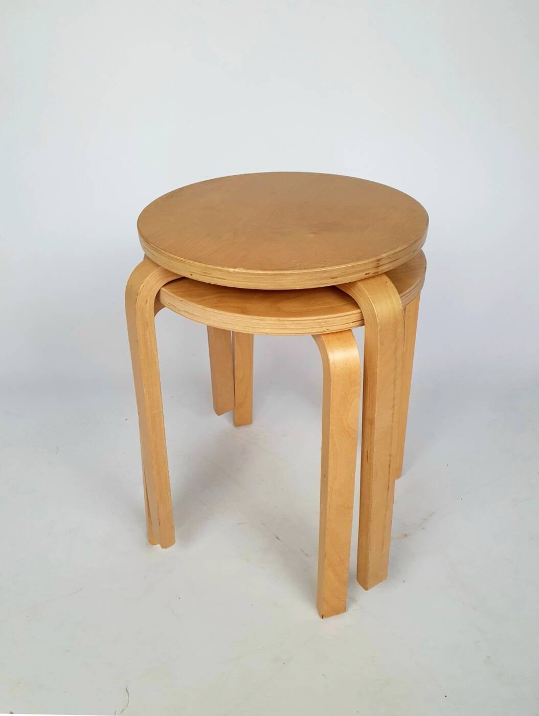 Pair of vintage Ikea "Frosta" curved wooden stools