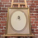 Portrait drawing of a child signed Feoers