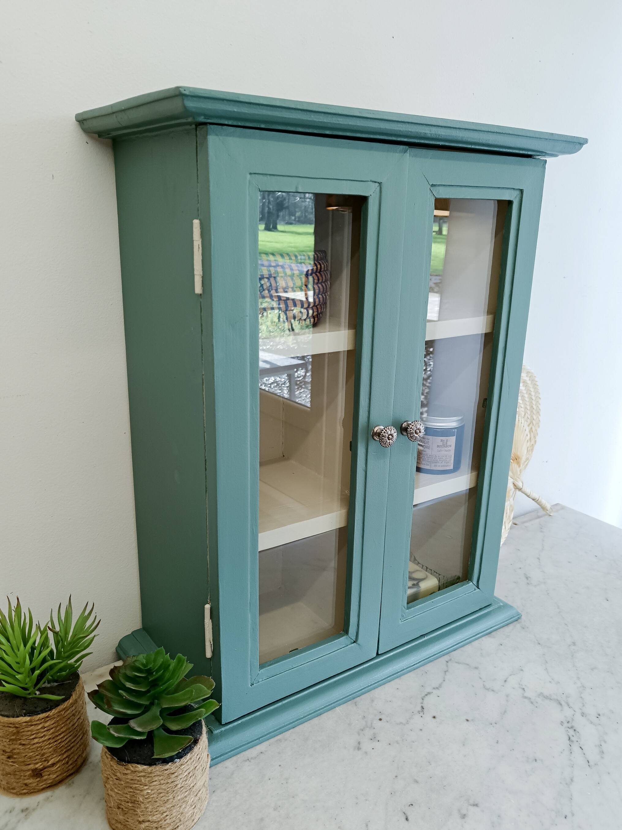 Green and beige 2-door wall display case