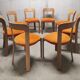 Suite of 8 Bruno Rey chairs