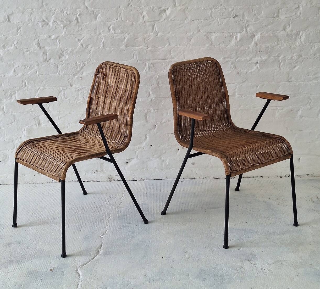 Pair of Swiss stackable rattan and iron dining elbow chairs, G Legler 1960s