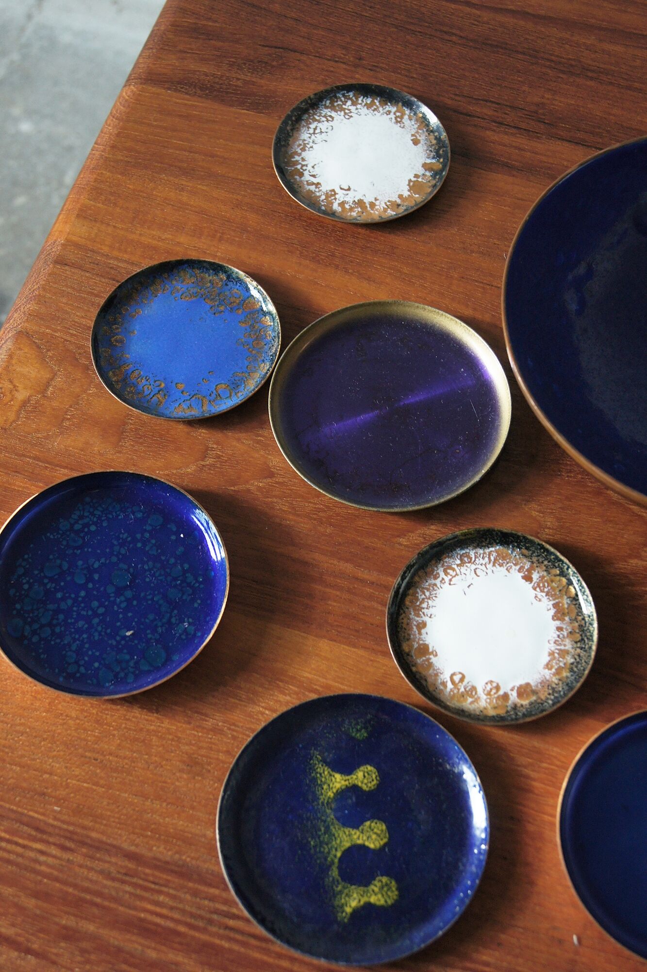 Vintage brass & enameled plates, set of 10