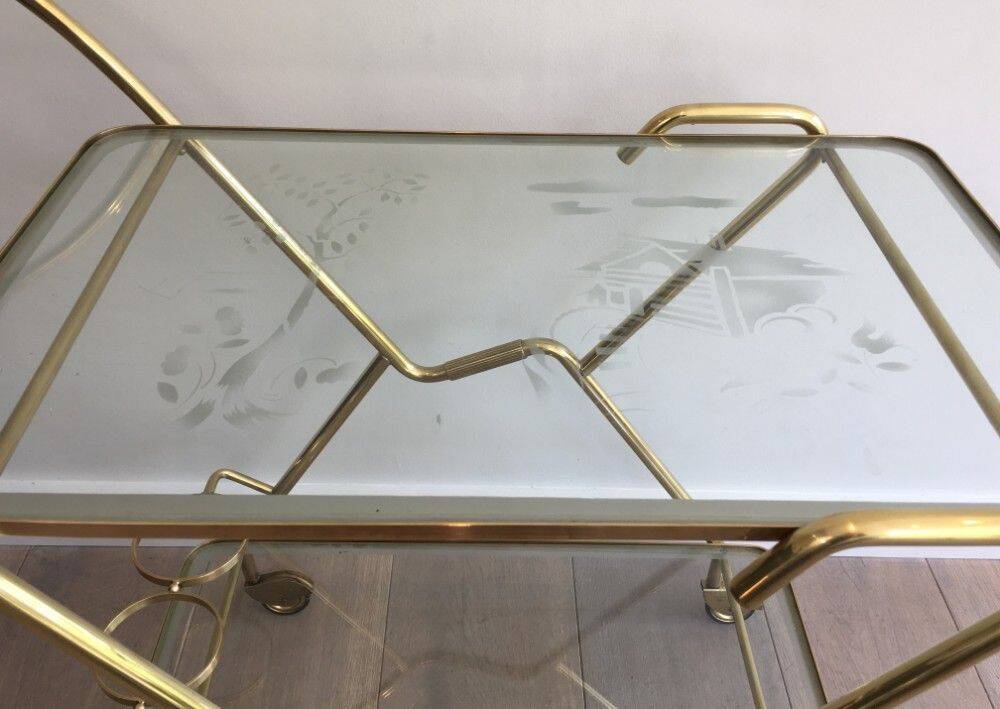 Italian designer rolling table in brass and engraved glass