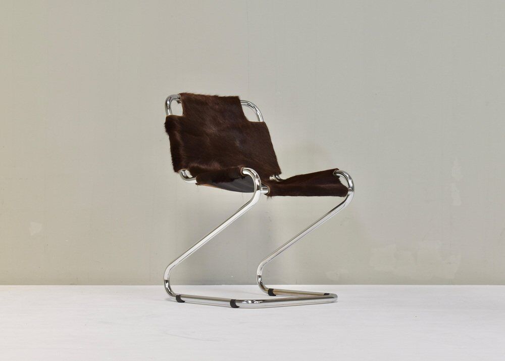 Vintage Italian chair in cowhide and chrome, 1970s