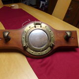 Marine style coat rack with porthole mirror
