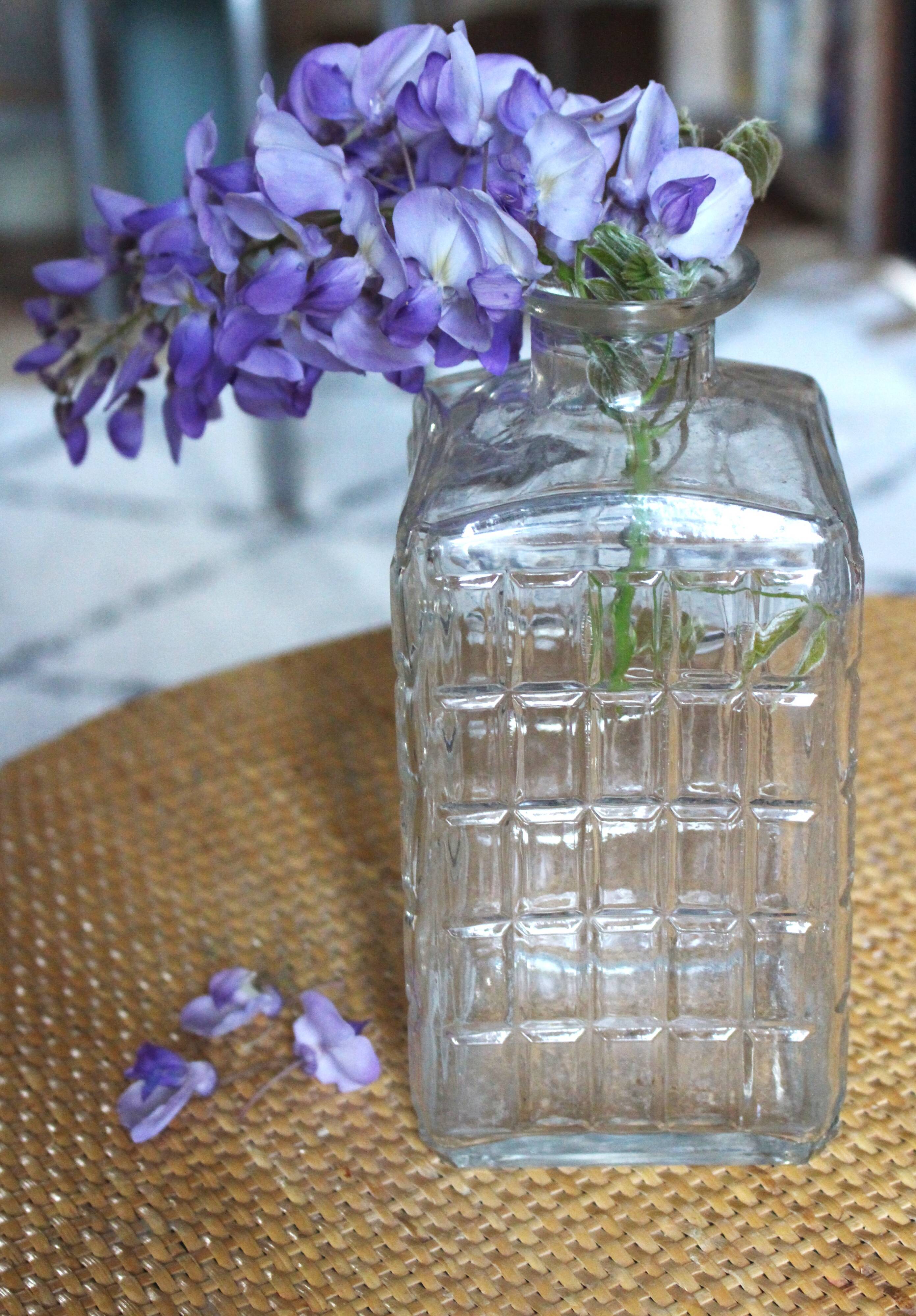 Vintage glass water carafe with rectangular vase.