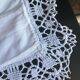 Old linen tablecloth with crocheted frills.