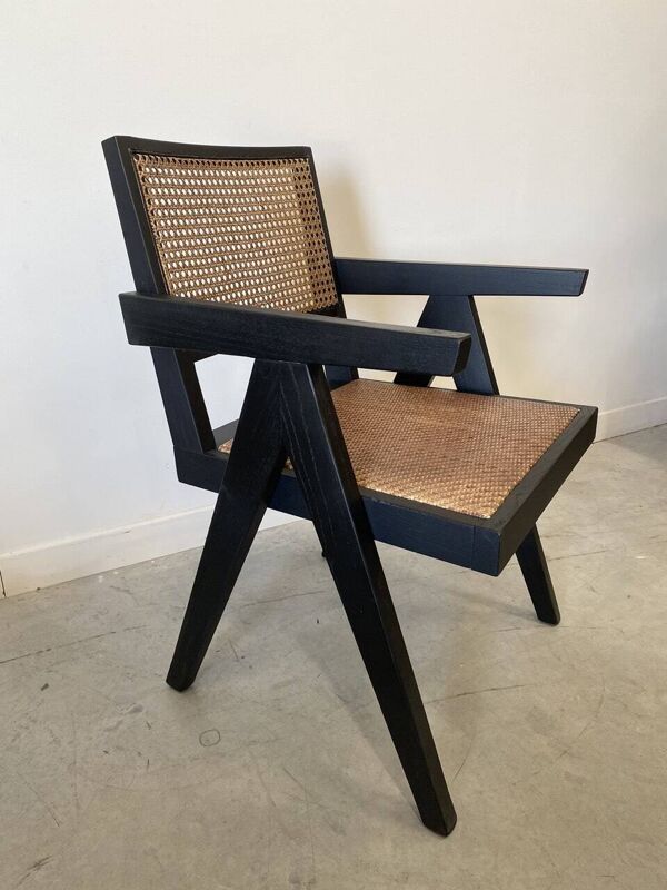 Fauteuil en bois noir et cannage