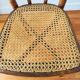Antique chair with caned seat
