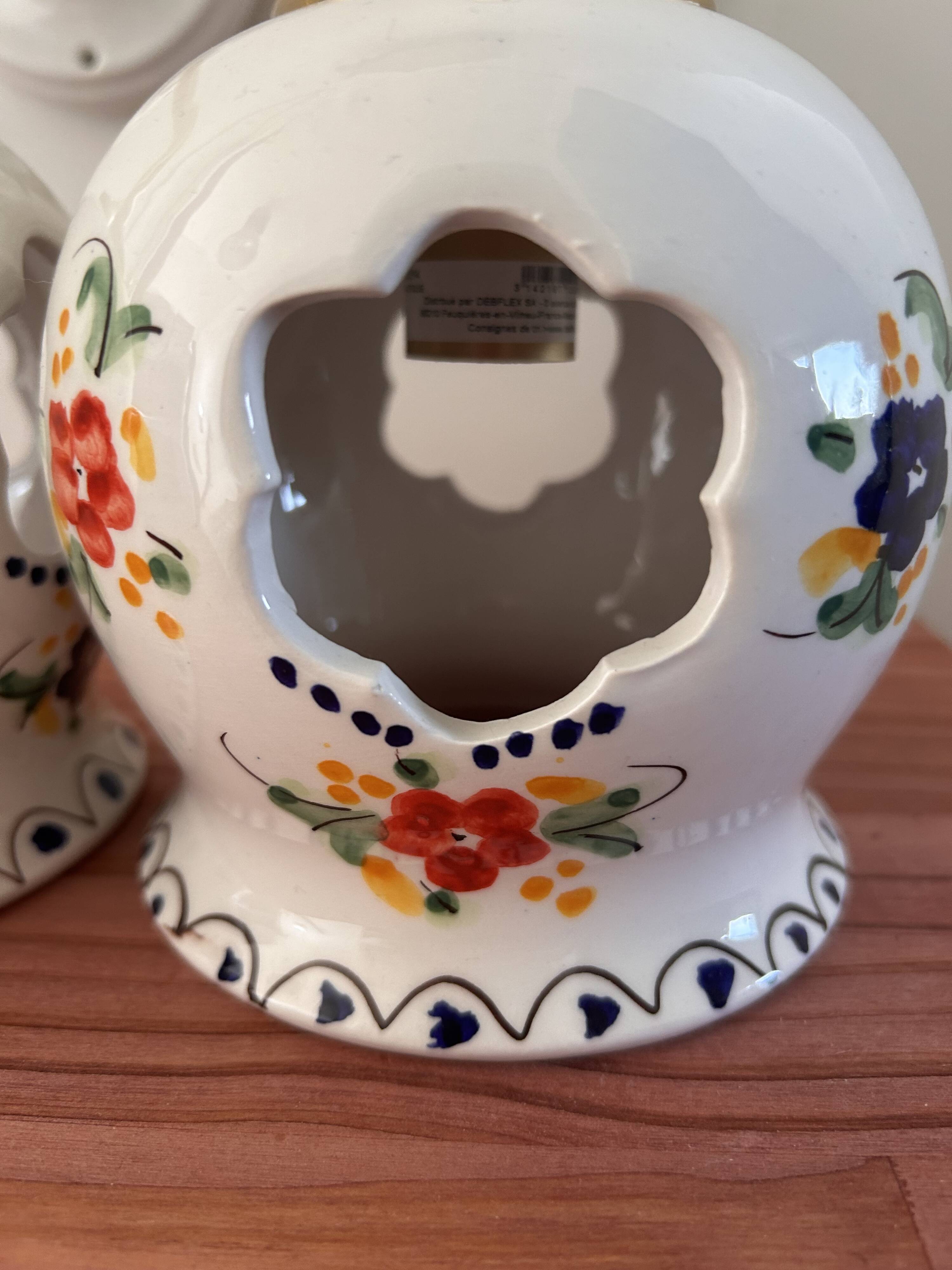 Pair of openwork ceramic wall lights