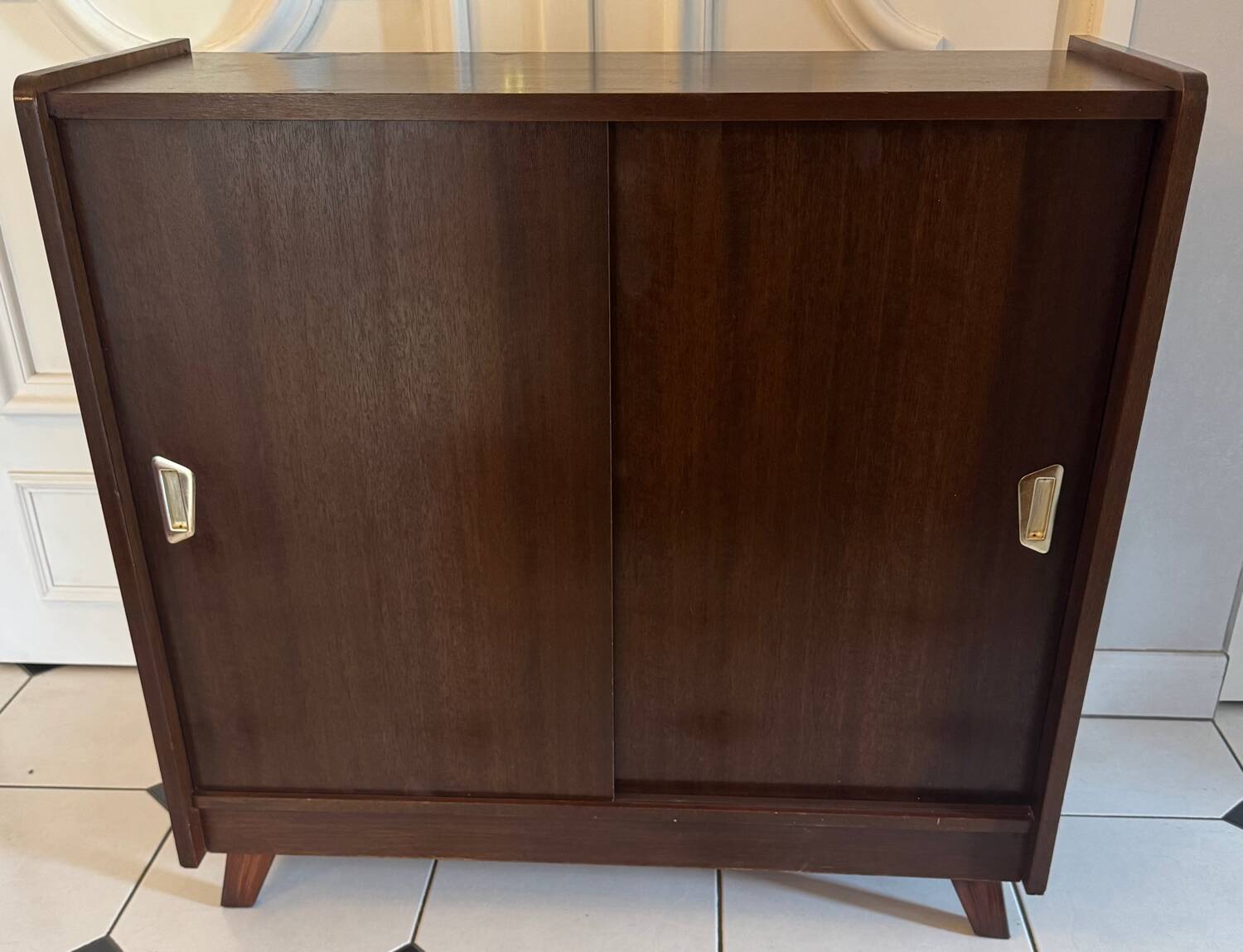 Vintage shoe cabinet with compass legs