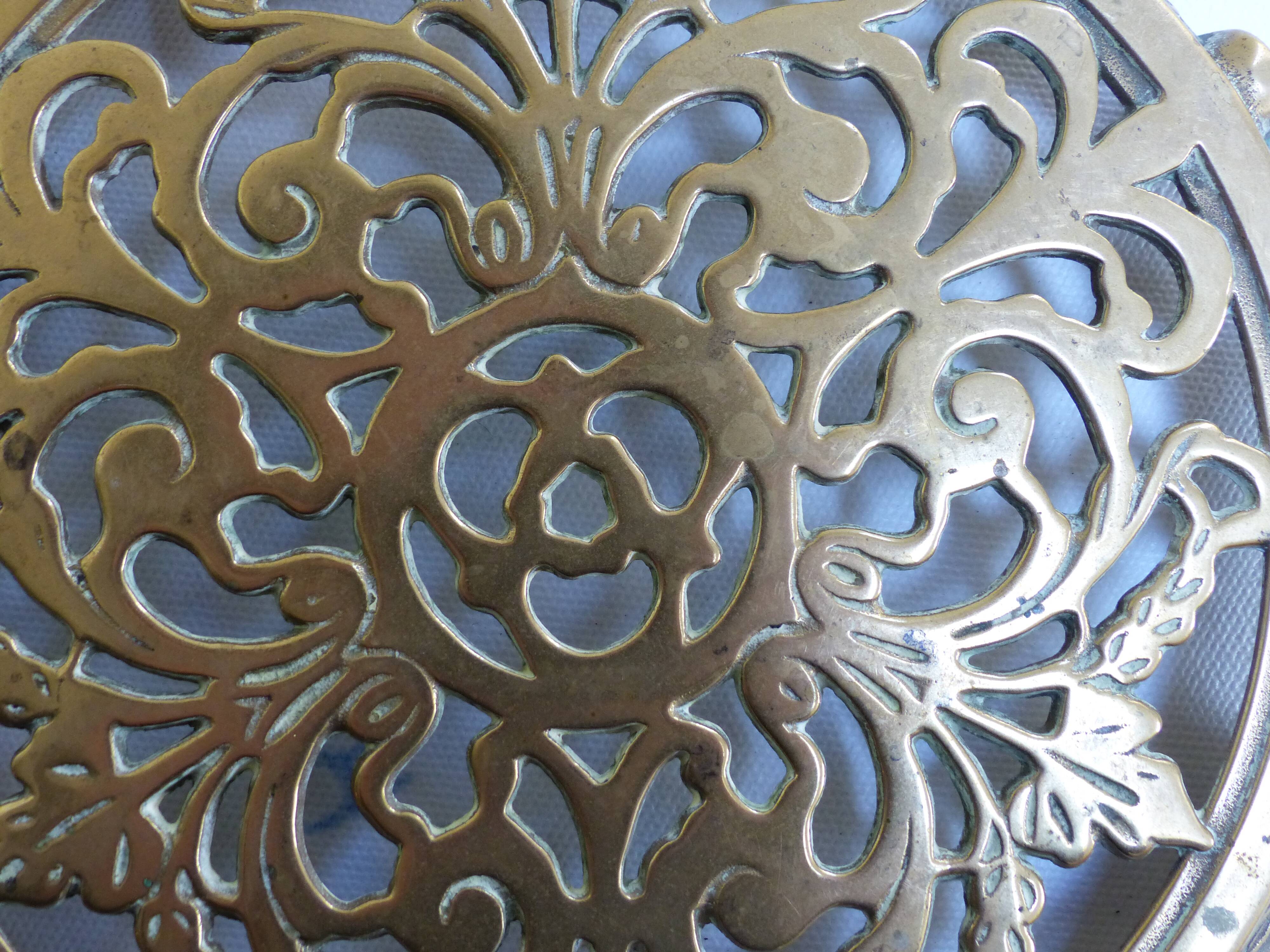 Worked copper trivet
