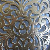 Worked copper trivet