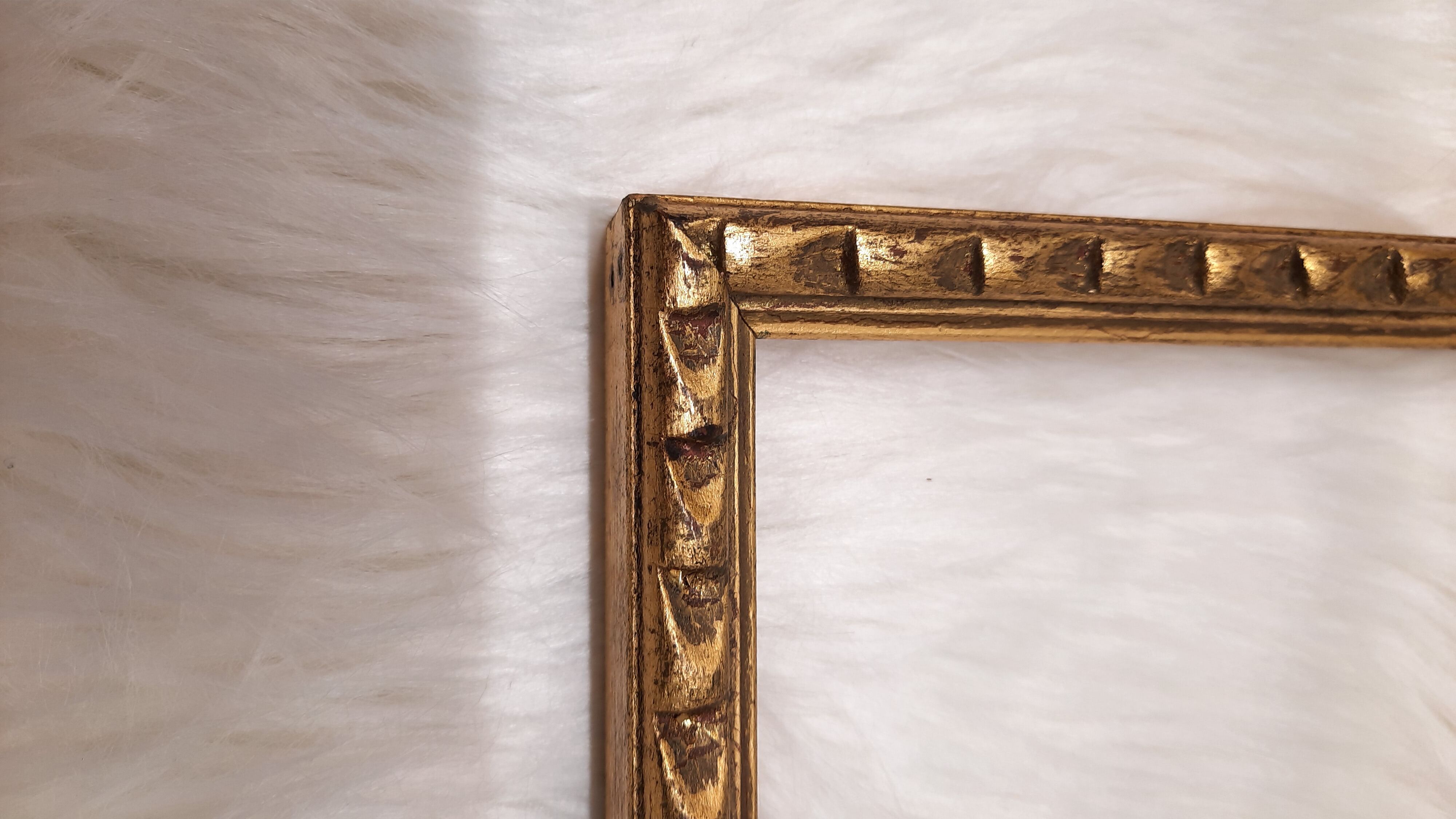 Golden wood frame with godrons