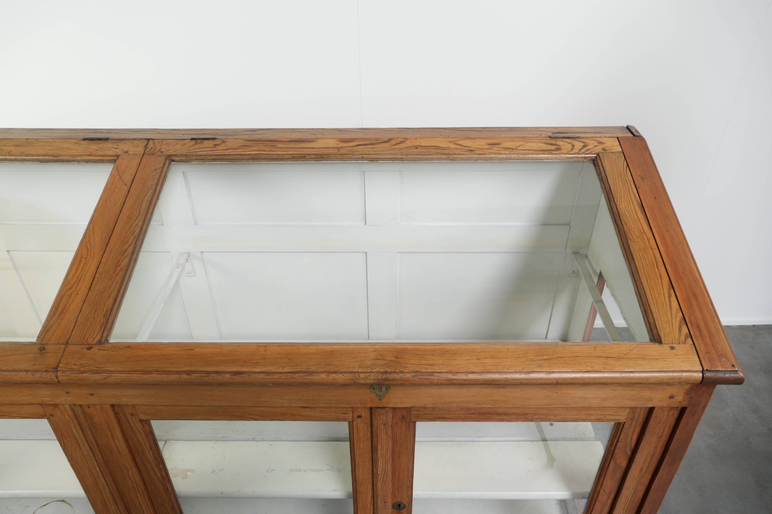 Vintage shop/museum display cabinet with shelves, doors and an opening top