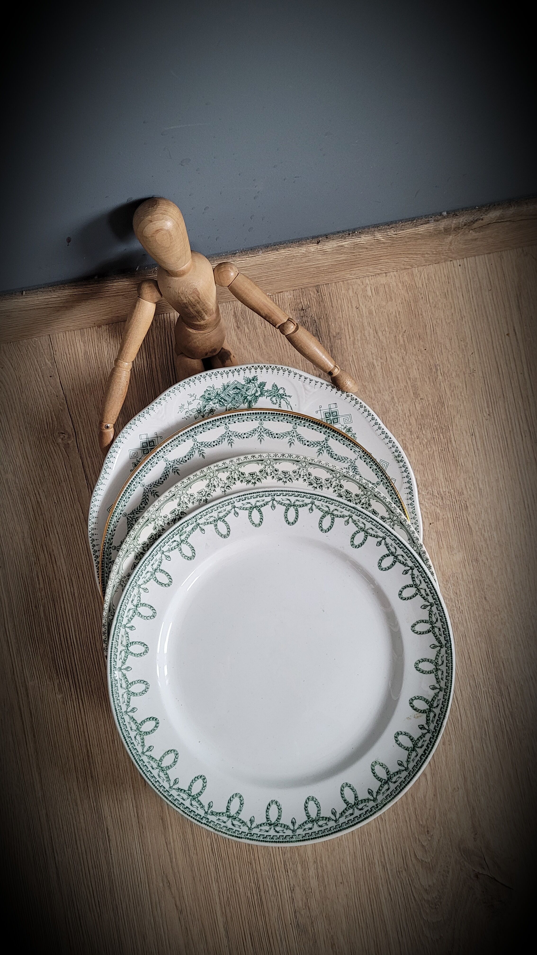 Set of 4 mismatched green plates