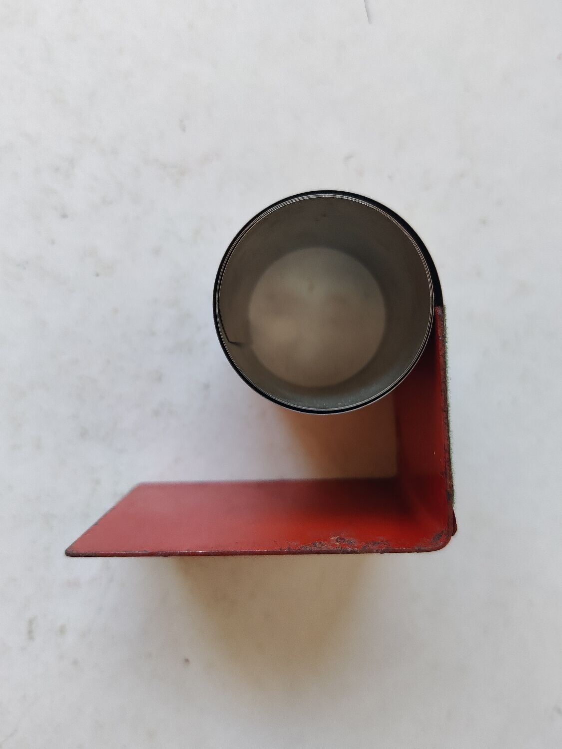 Modernist extendable bookends in brushed stainless steel and red 1970's