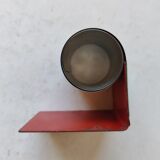 Modernist extendable bookends in brushed stainless steel and red 1970's