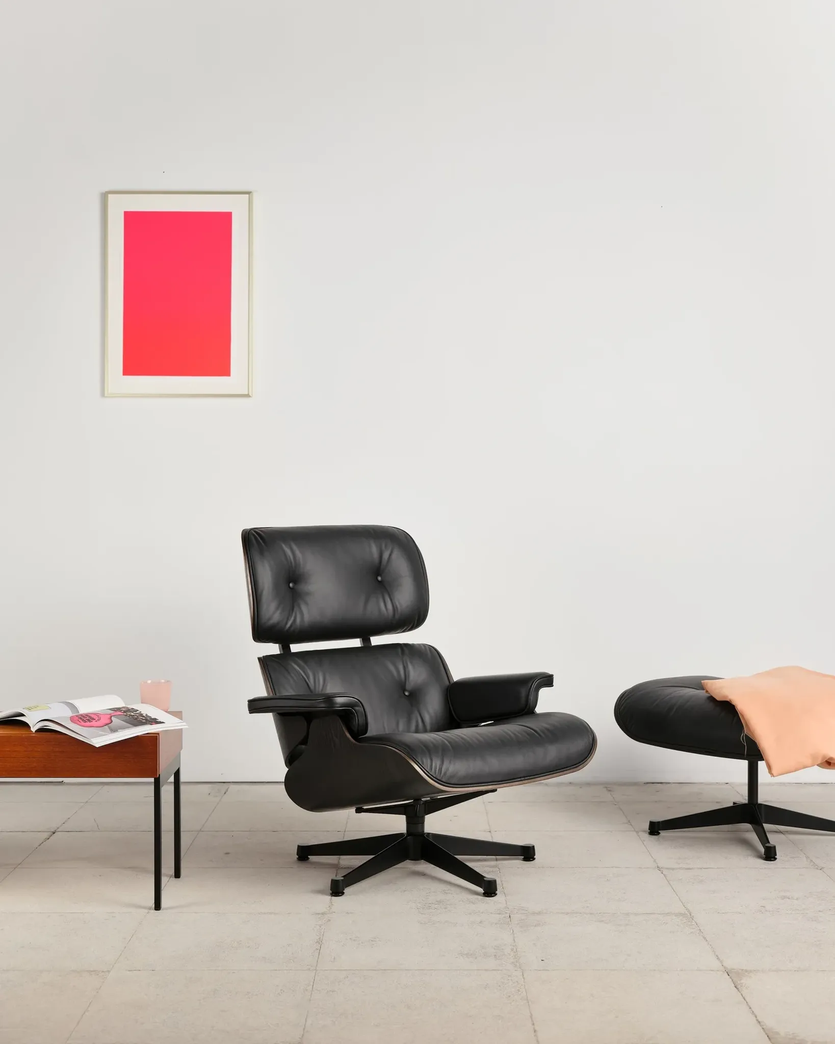 Lounge Chair and ottoman in black leather by Charles & Ray Eames, Vitra