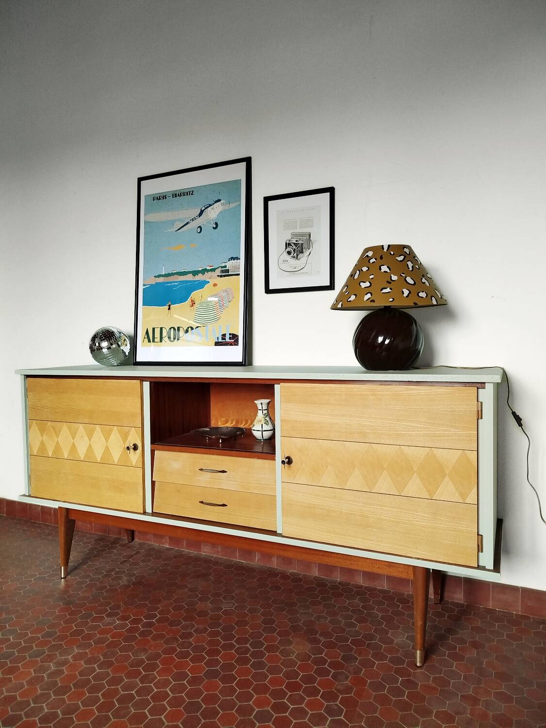 Wooden sideboard in soft green