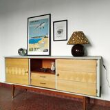 Wooden sideboard in soft green