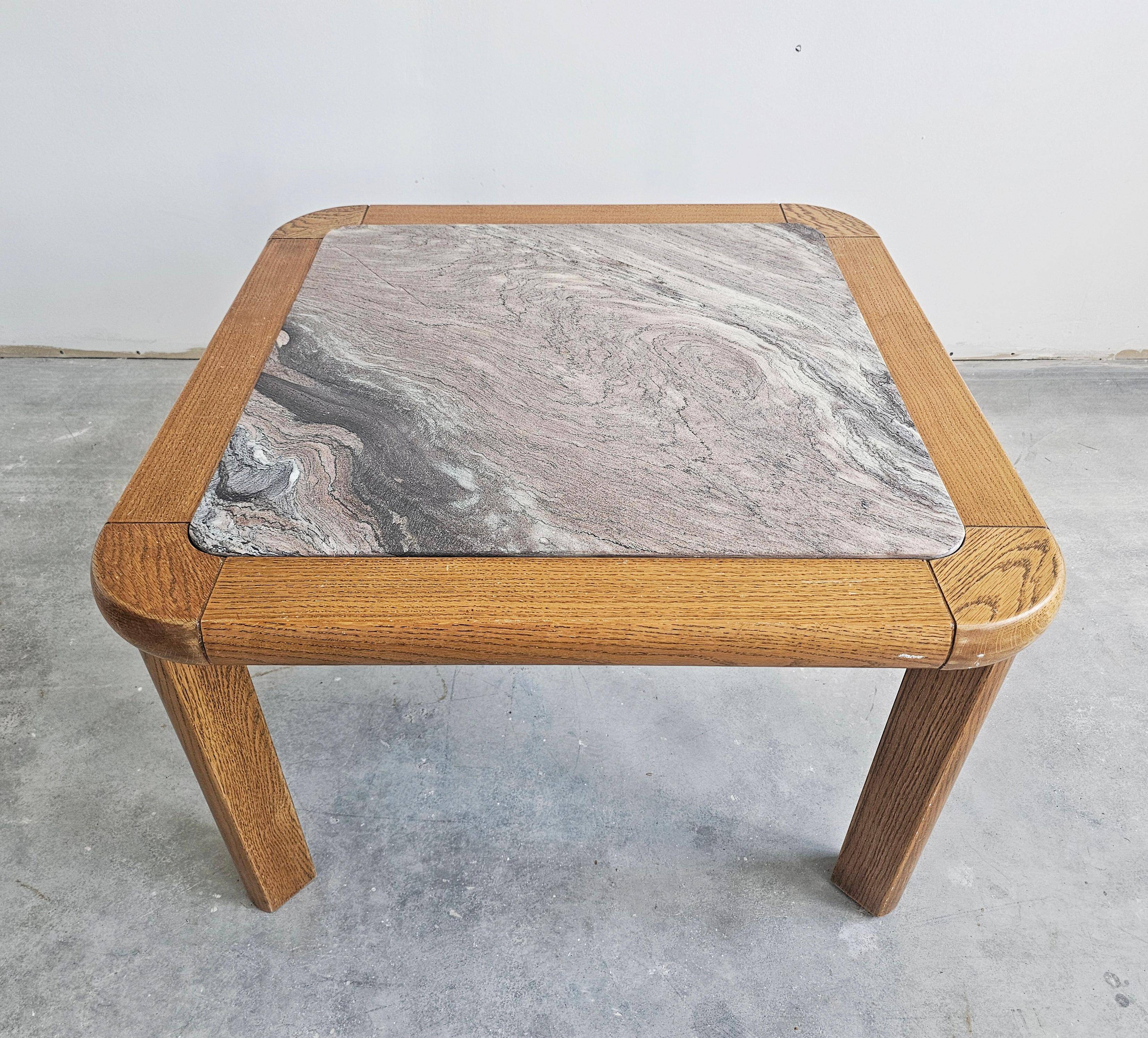Brutalist coffee table in solid oak with a Rosso Luana marble top.