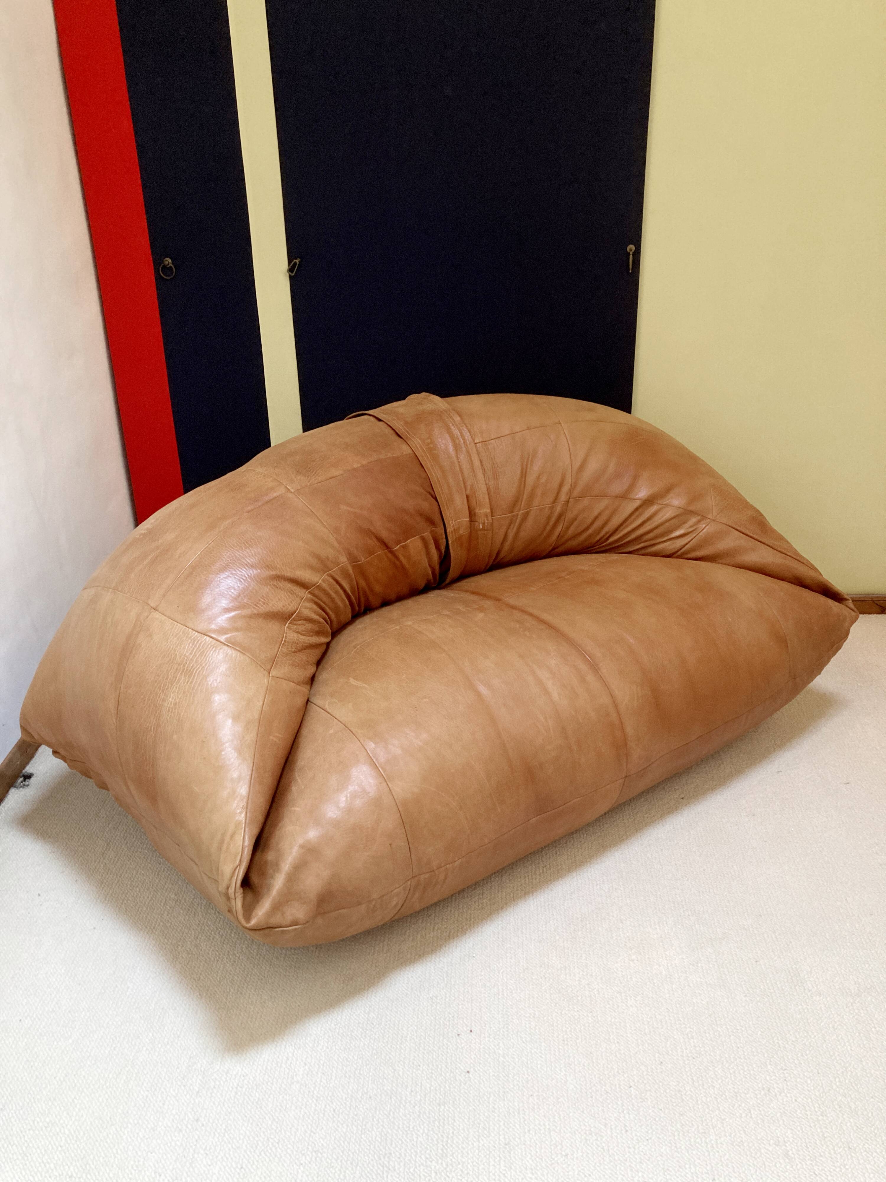 Two-seater leather pouf sofa by Raphaël Raffel for Honoré Paris