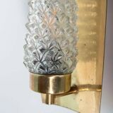 Vintage glass wall sconce from the 1960s in brass, mid-century light.