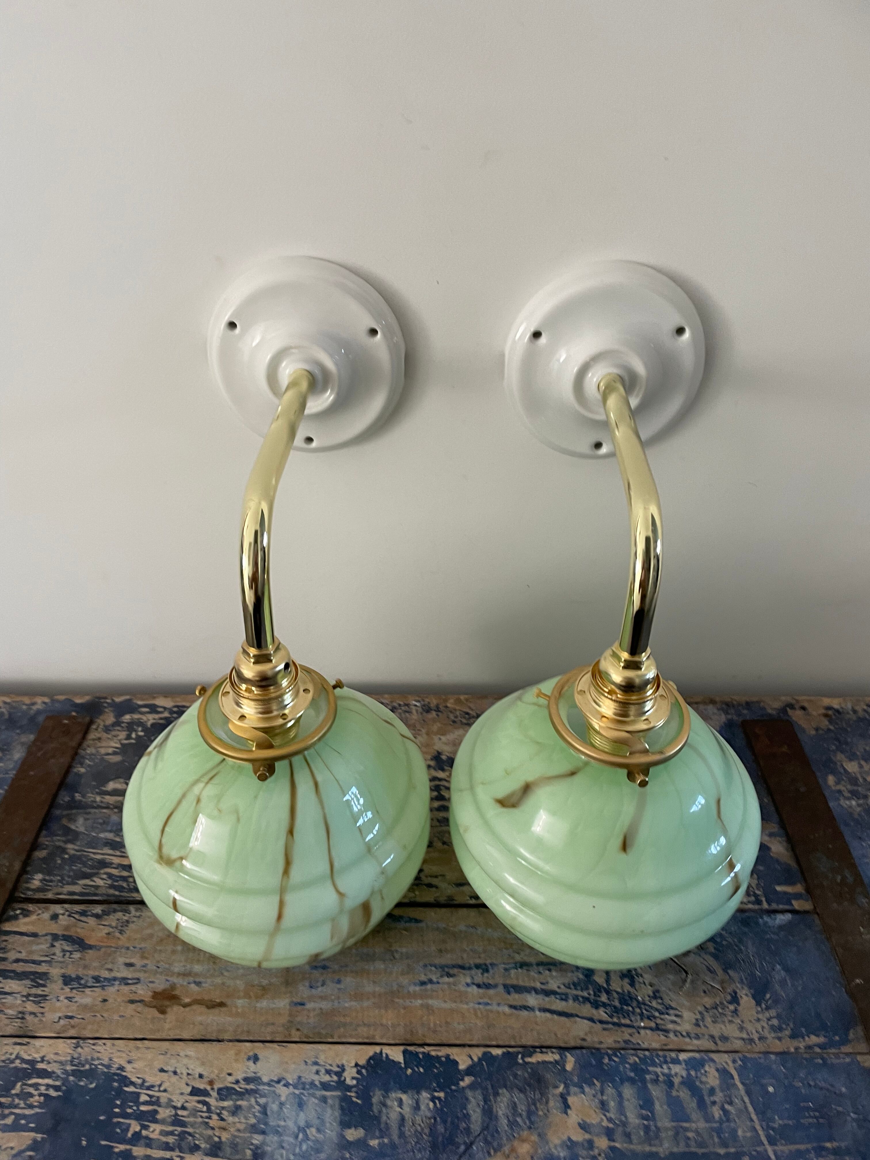 Pair of new electrified mint Art Deco sconces