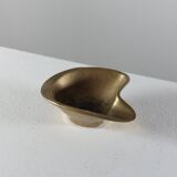 Vintage brass ashtray with an organic design from the 1950s.