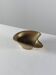 Vintage brass ashtray with an organic design from the 1950s.