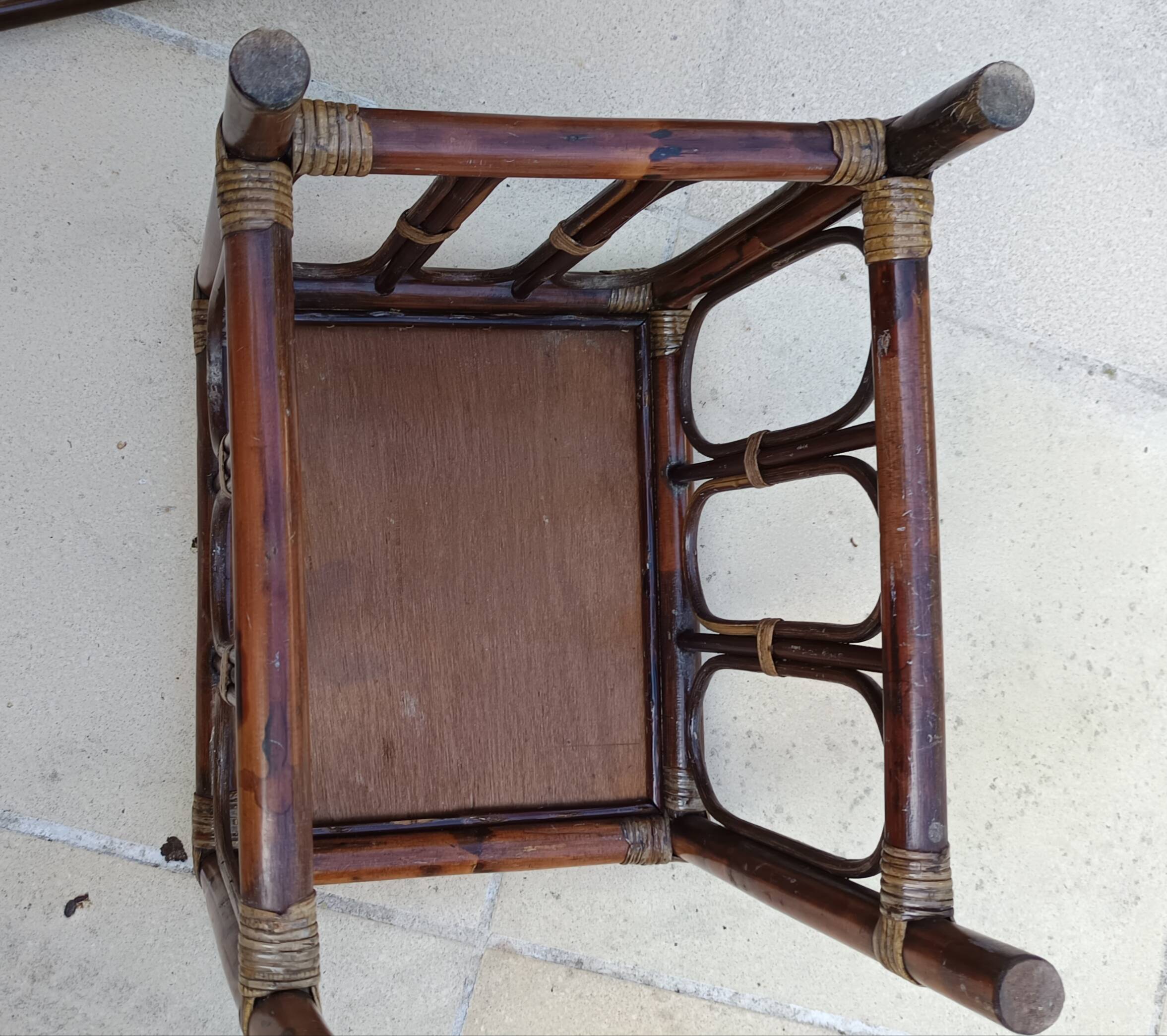 Nest of low tables in rattan, stackable.
