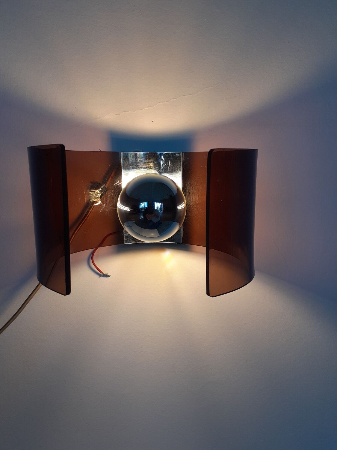 Space age plexiglass wall light.