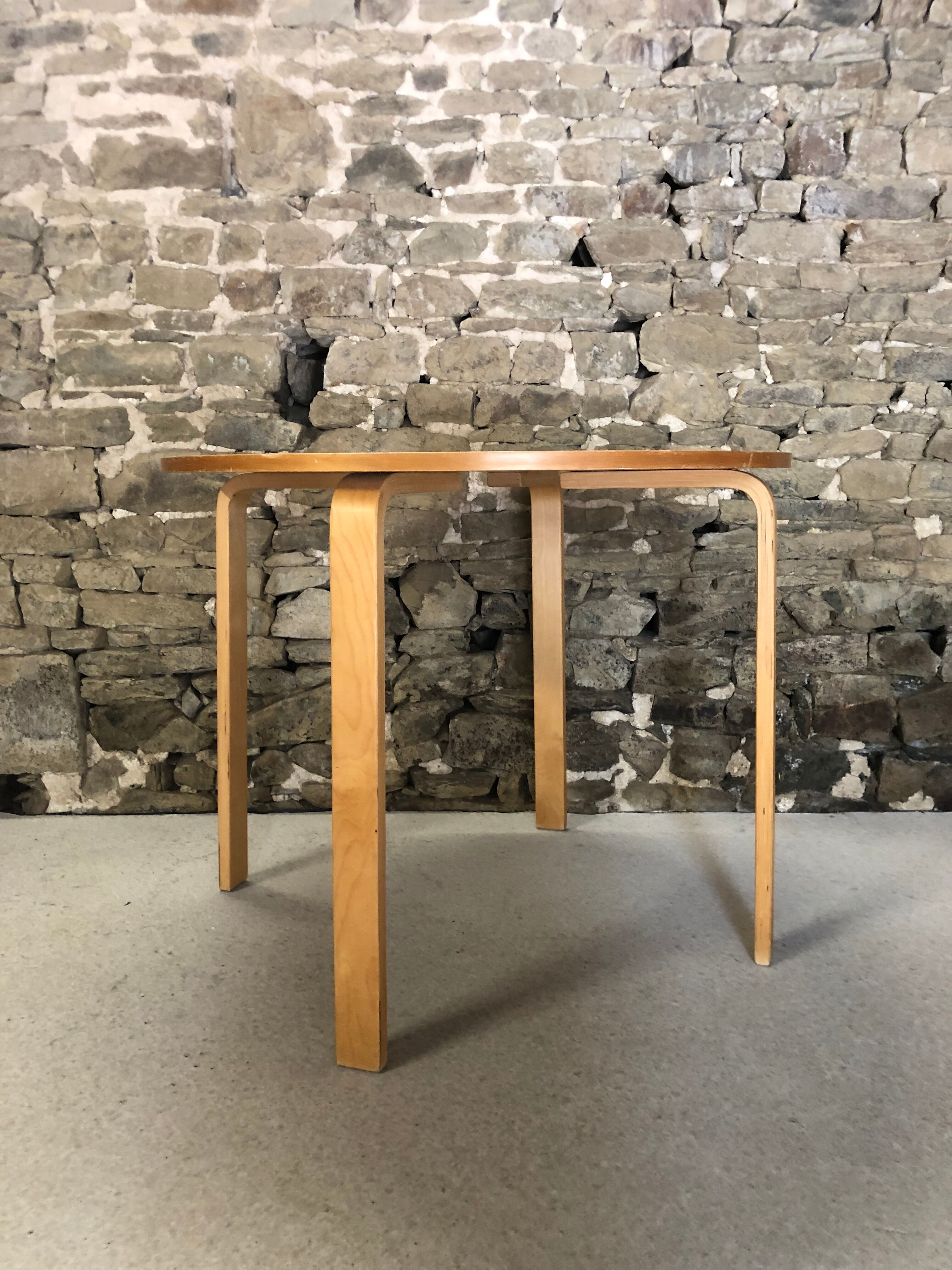 Round dining table in vintage wood