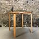 Round dining table in vintage wood