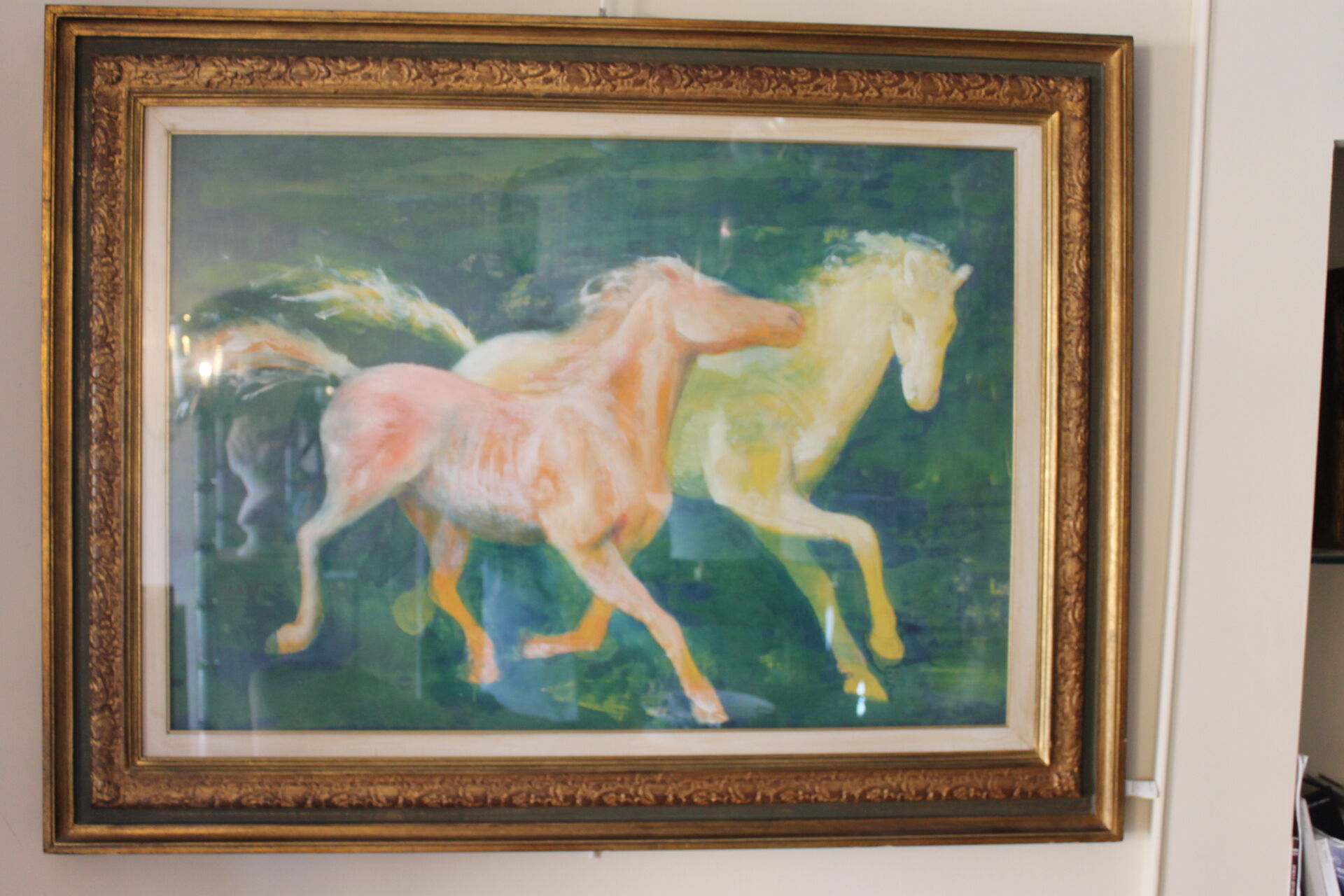 Framed painting representing horses, signed, XX th