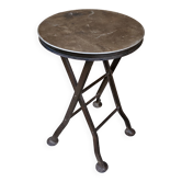 Old industrial folding steel stool
