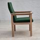 1980s, Danish armchair by Høng Stole, green furniture wool, oak wood.