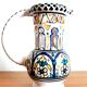 Deceptive pitcher in glazed earthenware