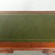 Elegant English style desk with green leather top, gold details and drawers