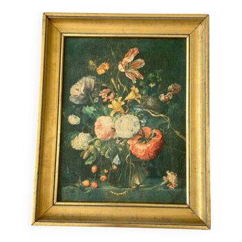 Gilded wood framing bouquet of flowers