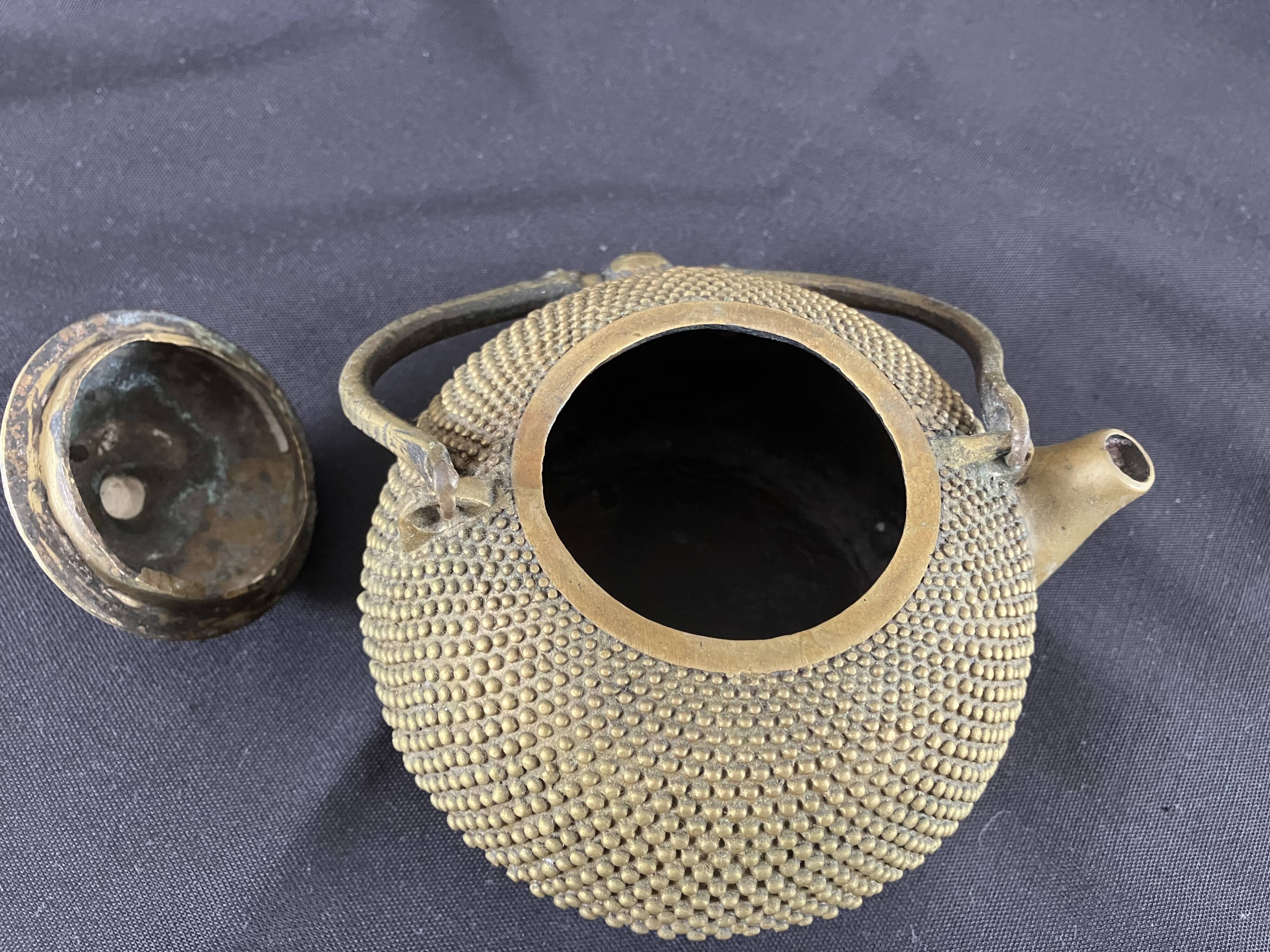 Chinese teapot in brass