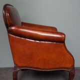 Old armchair in sheep leather
