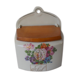 Saltbox in earthenware flowers cover wood